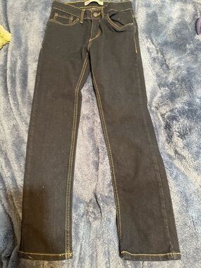 Levi's Dark Blue Jeans with Tan Leather Patch and Yellow Stitching